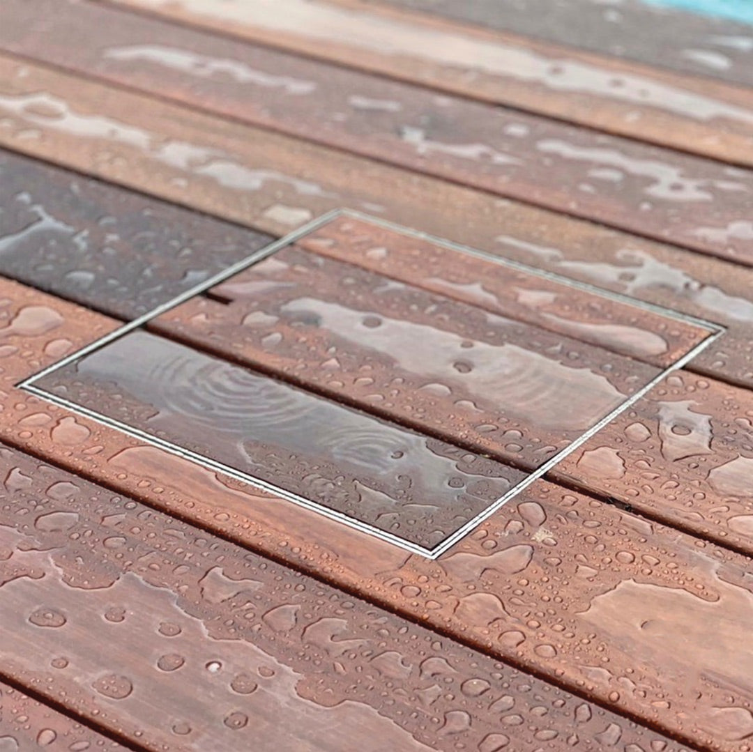 HIDE Access Cover showing decking infill after rain