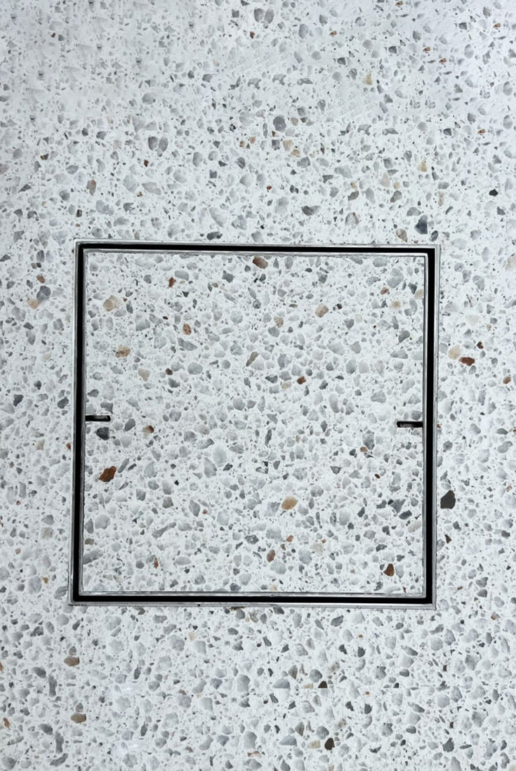 HIDE concrete drain cover filled with concrete and polished