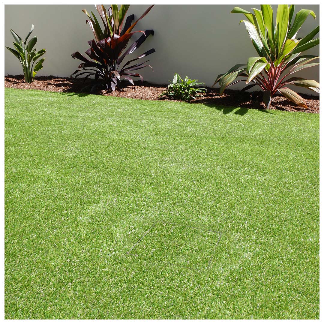 AFTER image of well camouflaged HIDE drain cover using synthetic grass infill