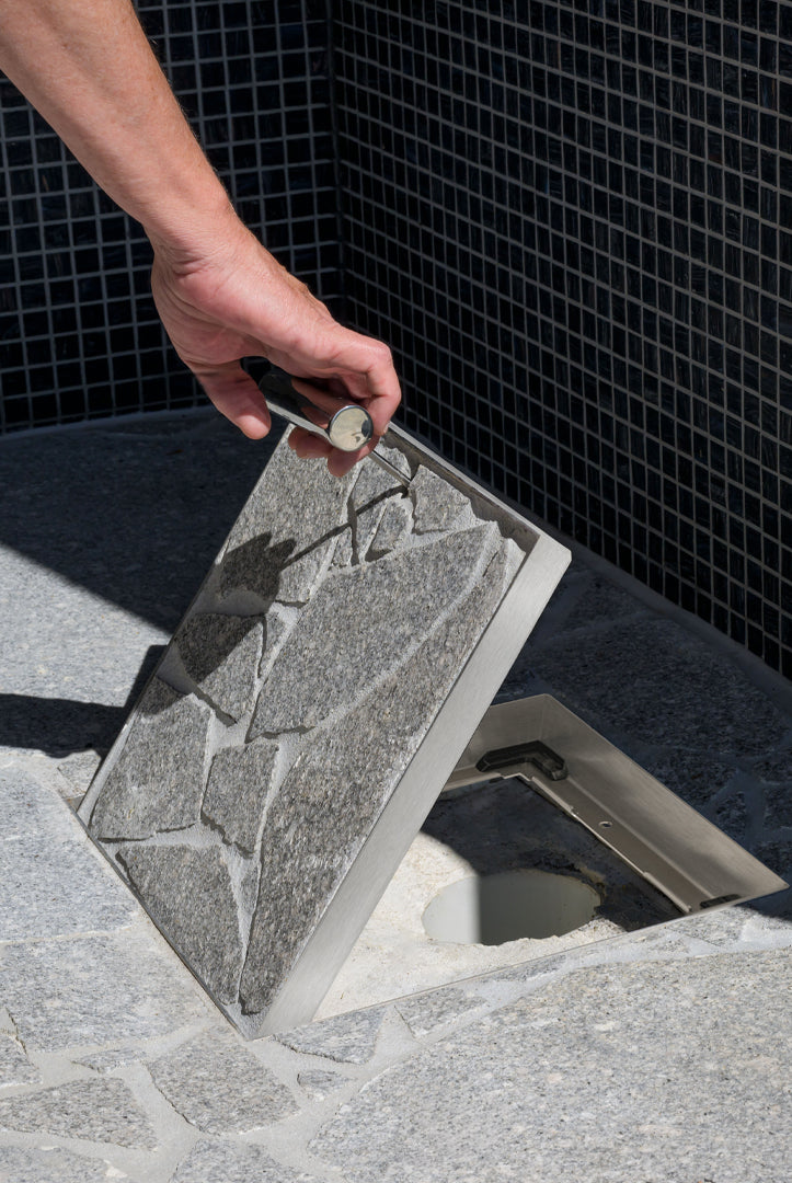 HIDE Drain Cover being opened with key