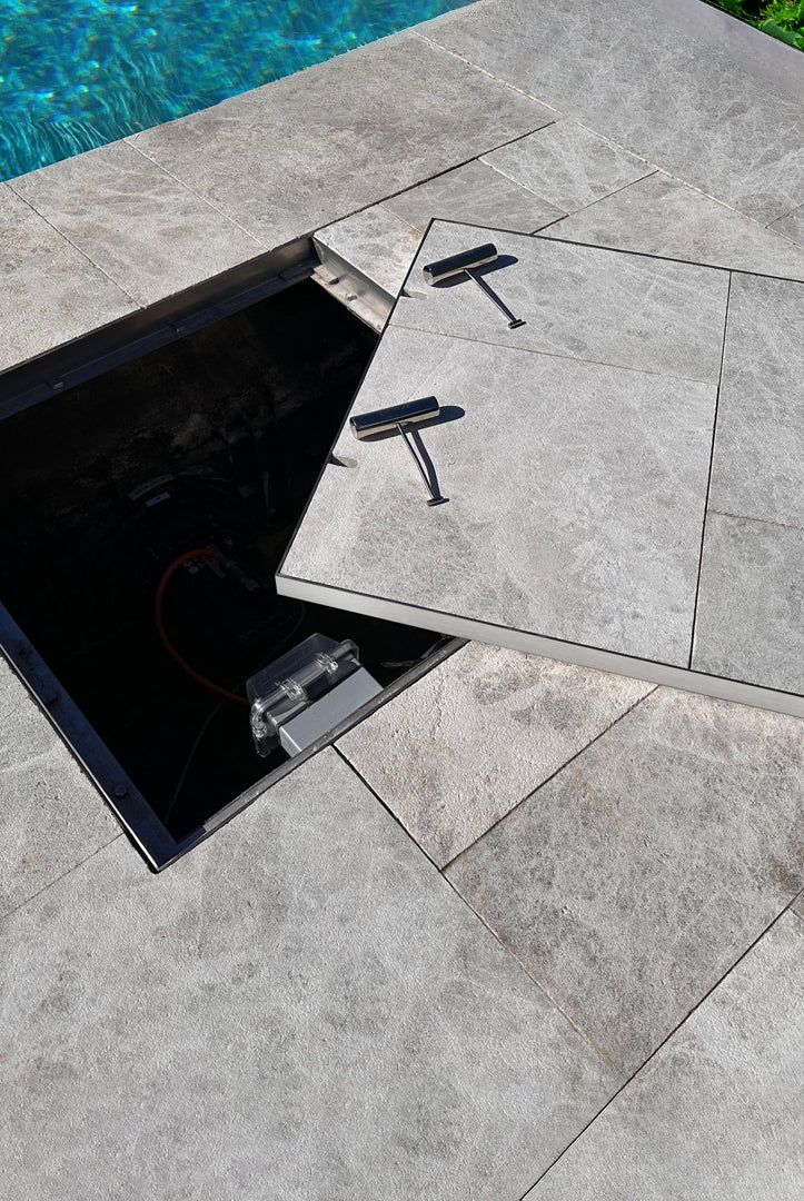 HIDE manhole cover with 2 keys to open it