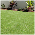 AFTER image of well camouflaged HIDE drain cover using synthetic grass infill