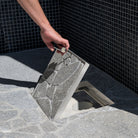 HIDE Drain Cover being opened with key