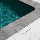 HIDE Skimmer Cover with coping and poolside tile infills to match