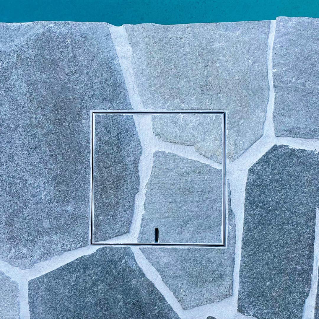 HIDE Skimmer Cover with crazy paving infill to match surrounds perfectly