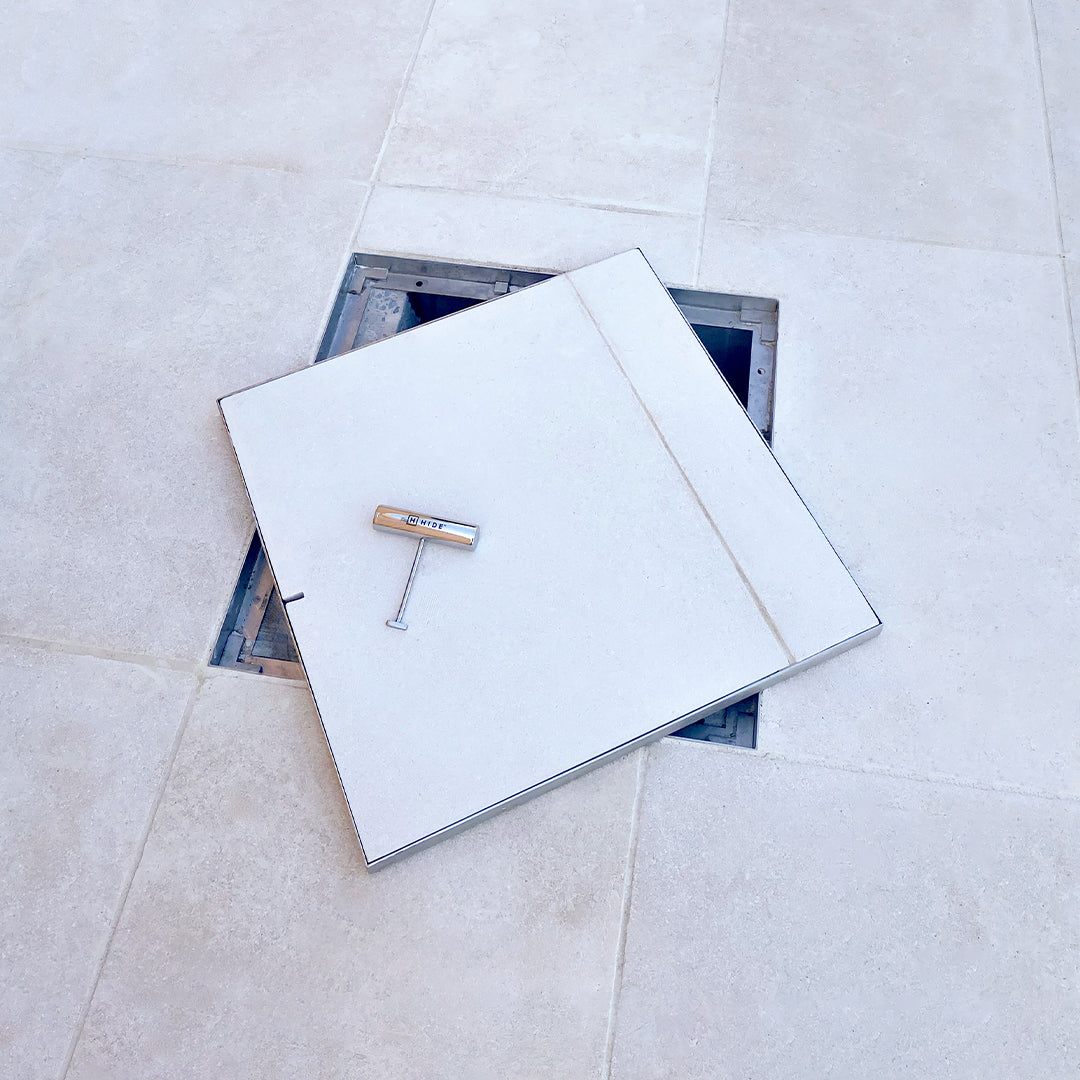 HIDE manhole cover with one key to open it