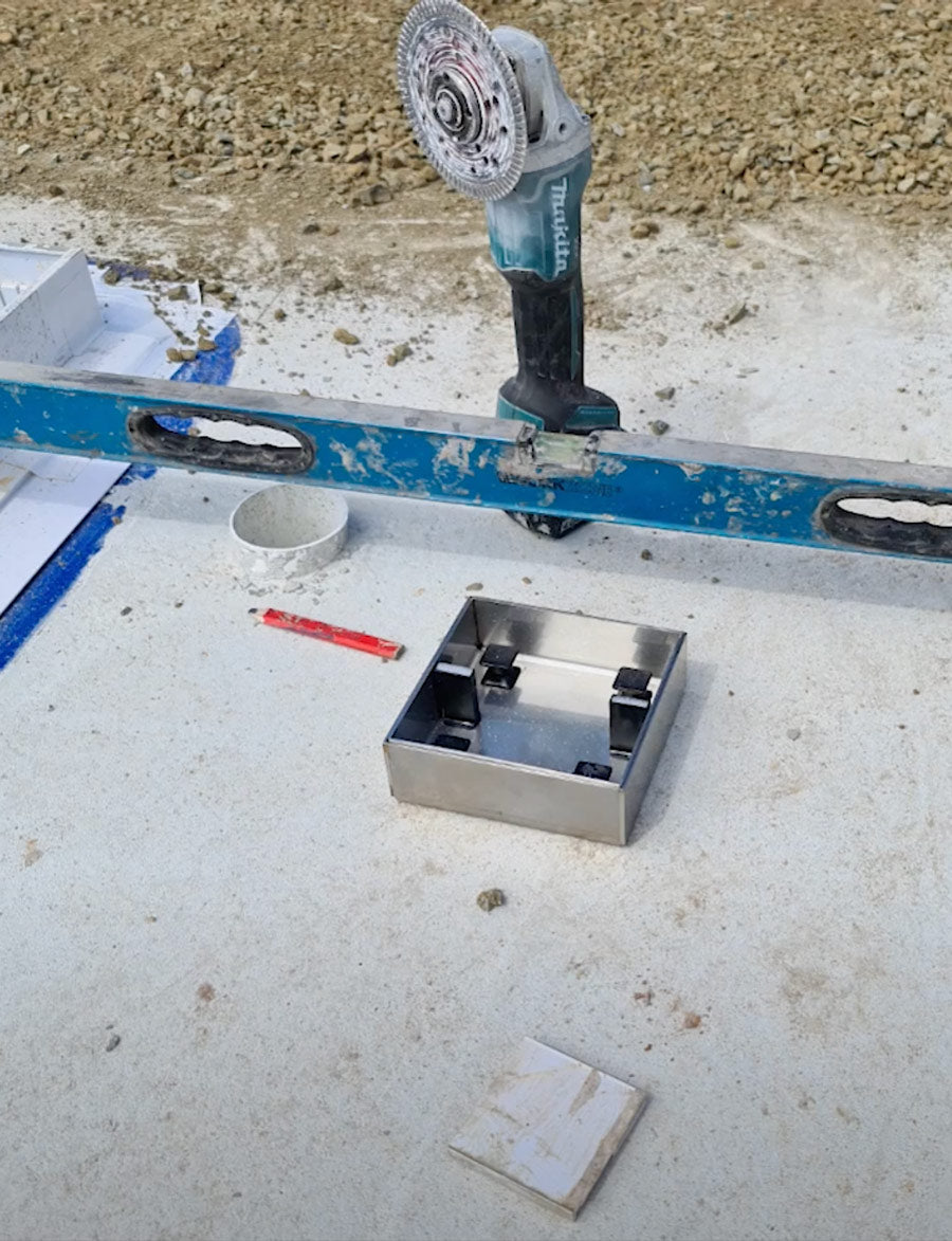 HIDE 156mm Concrete Cover sitting on ground ready to be installed.